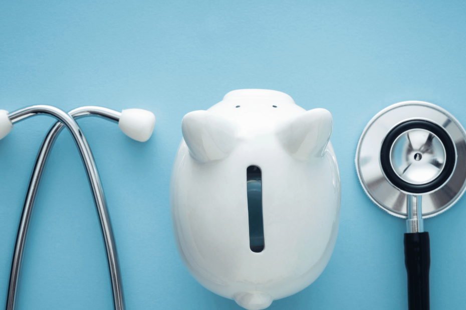 Stethoscope and piggy bank